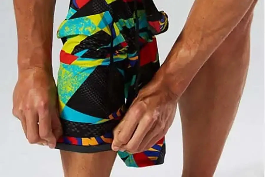 man putting on a tight tech suite from Reddiset